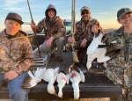 Hunters with a few snow geese after slow AM