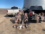 Hunters with thier specks and a snow goose