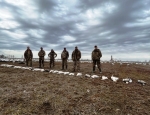 Hunter with their  pile of Missouri snow geese