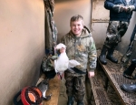 Youth hunter with snow goose taken on SE Missouri snow goose hunting trip