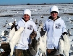 hunters with a few snow geese
